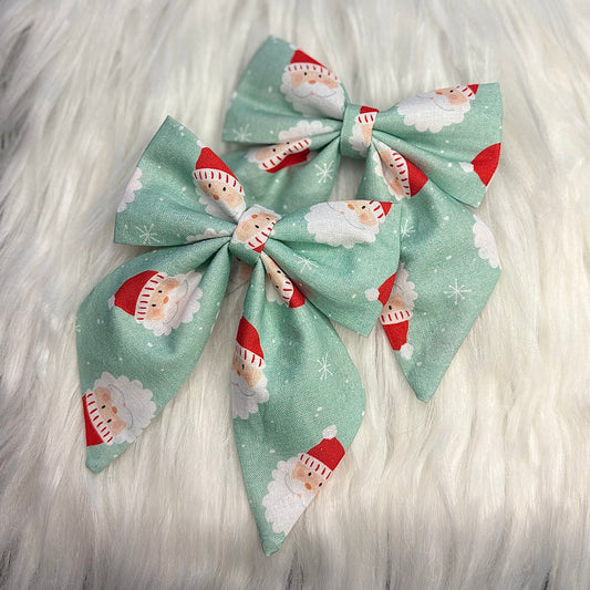 Santa on Green Bow Hair Clip with Tails Pack of 2