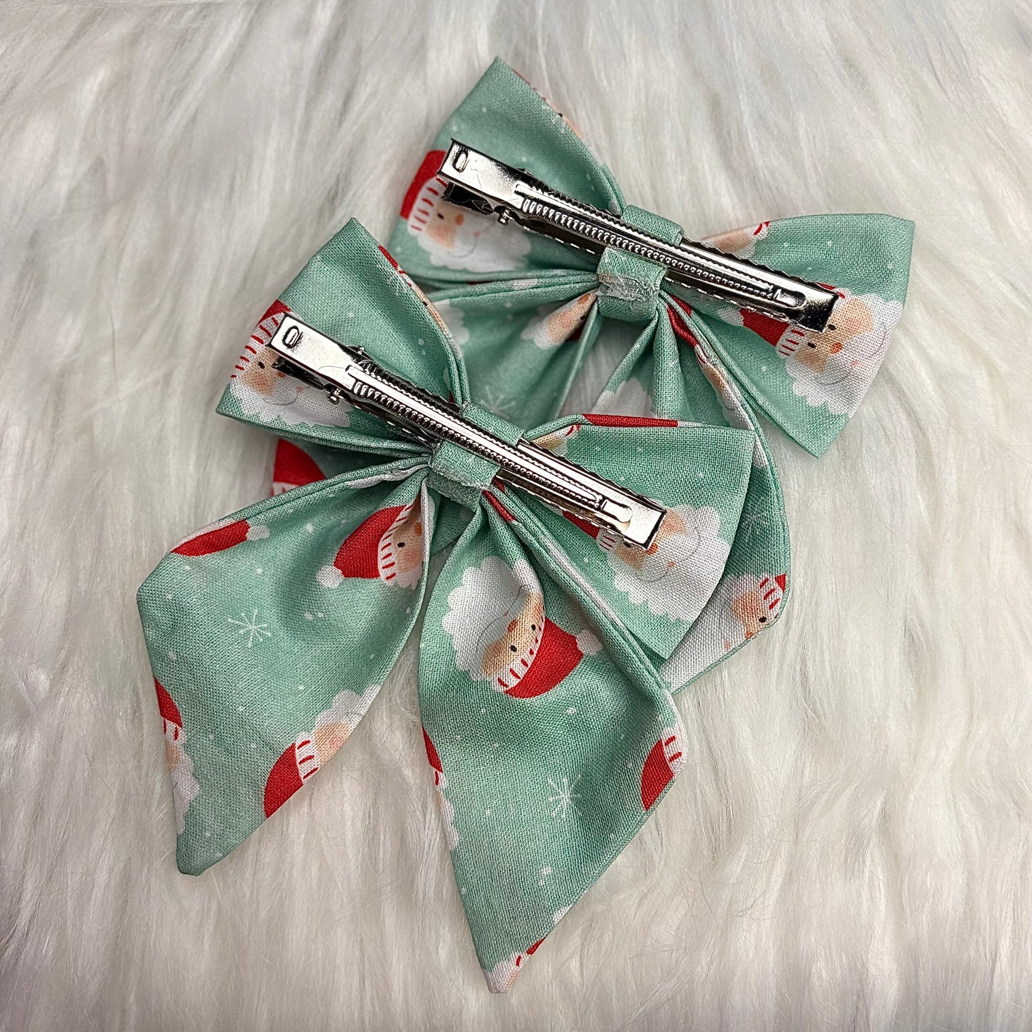Santa on Green Bow Hair Clip with Tails Pack of 2