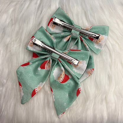 Santa on Green Bow Hair Clip with Tails Pack of 2